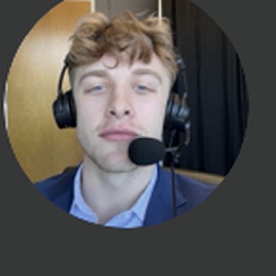Colin Calvert wearing a broadcast headset